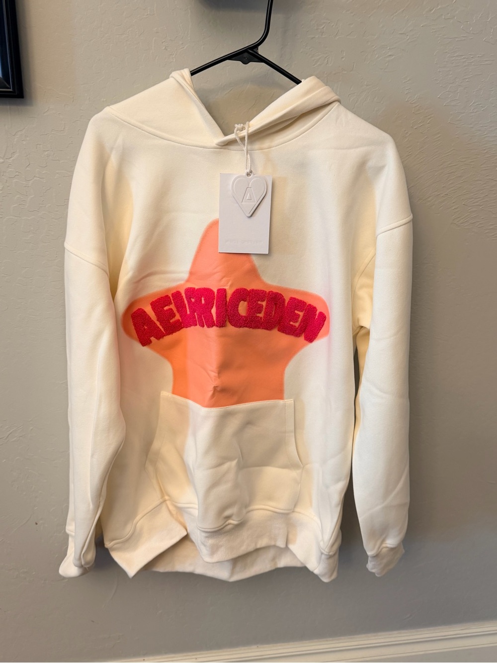 Aelfric Eden Kids Cream Hoodie with Orange Star & Pink Logo